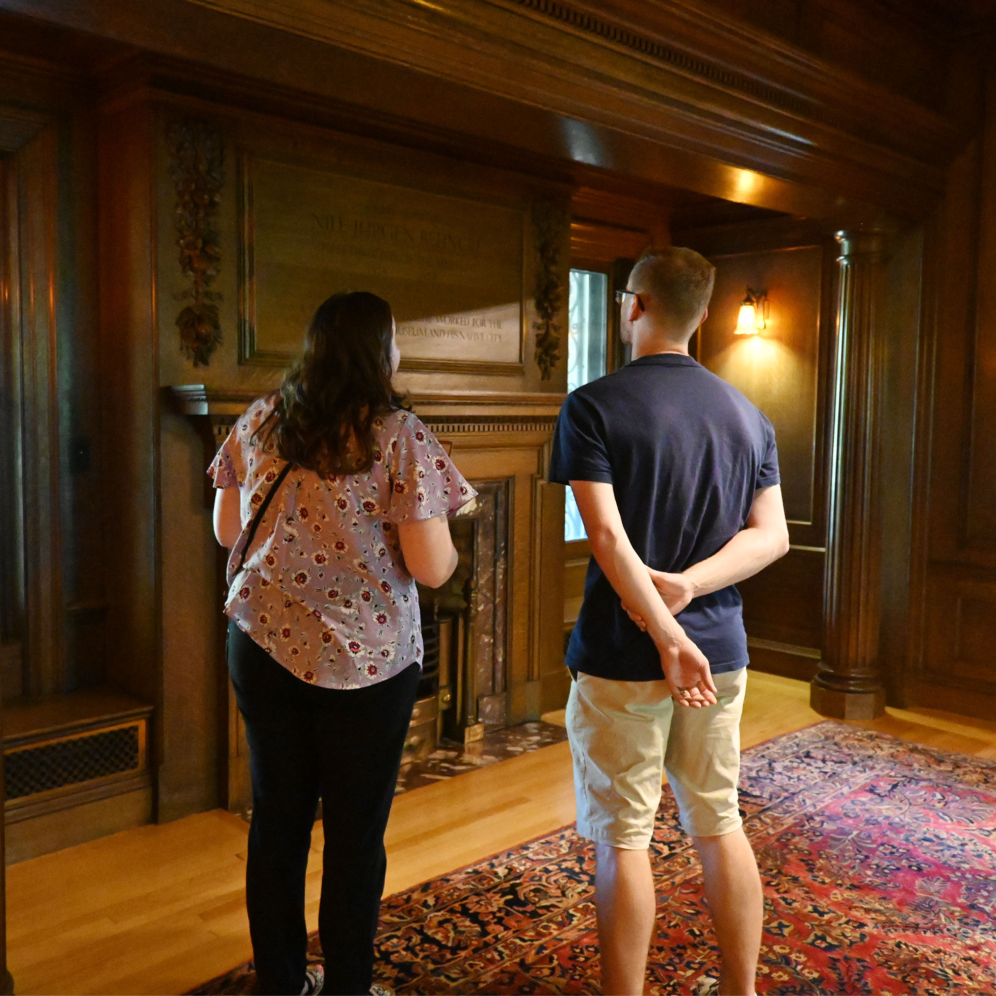 Visitors in the Historic Sawyer Home grand hall