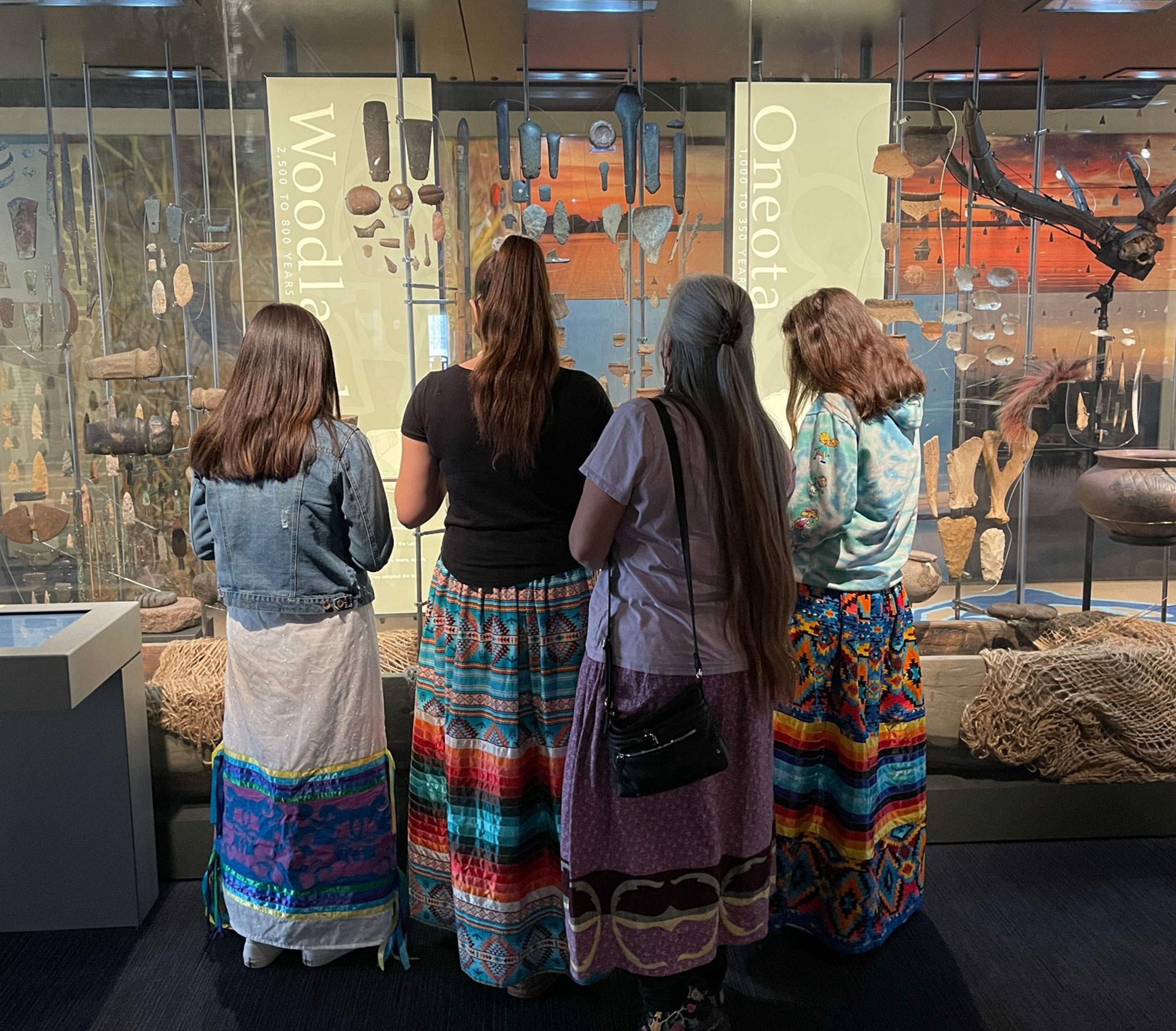 People viewing the People of the Waters exhibit