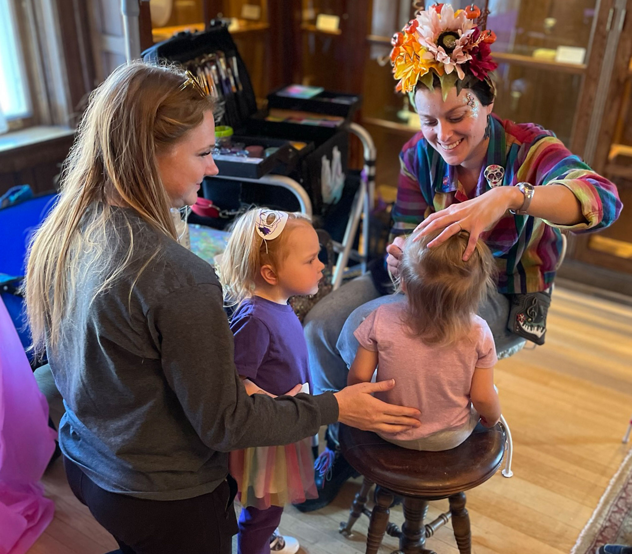Face painting in the Historic Sawyer Home library