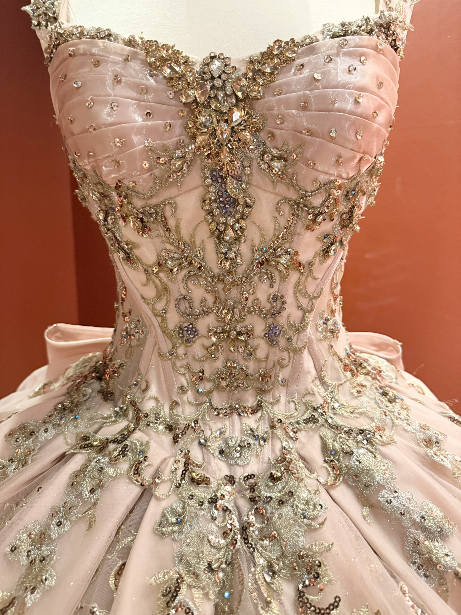 Detail of bodice of pink quinceañera dress worn by Marissa Bustillos in 2025.
