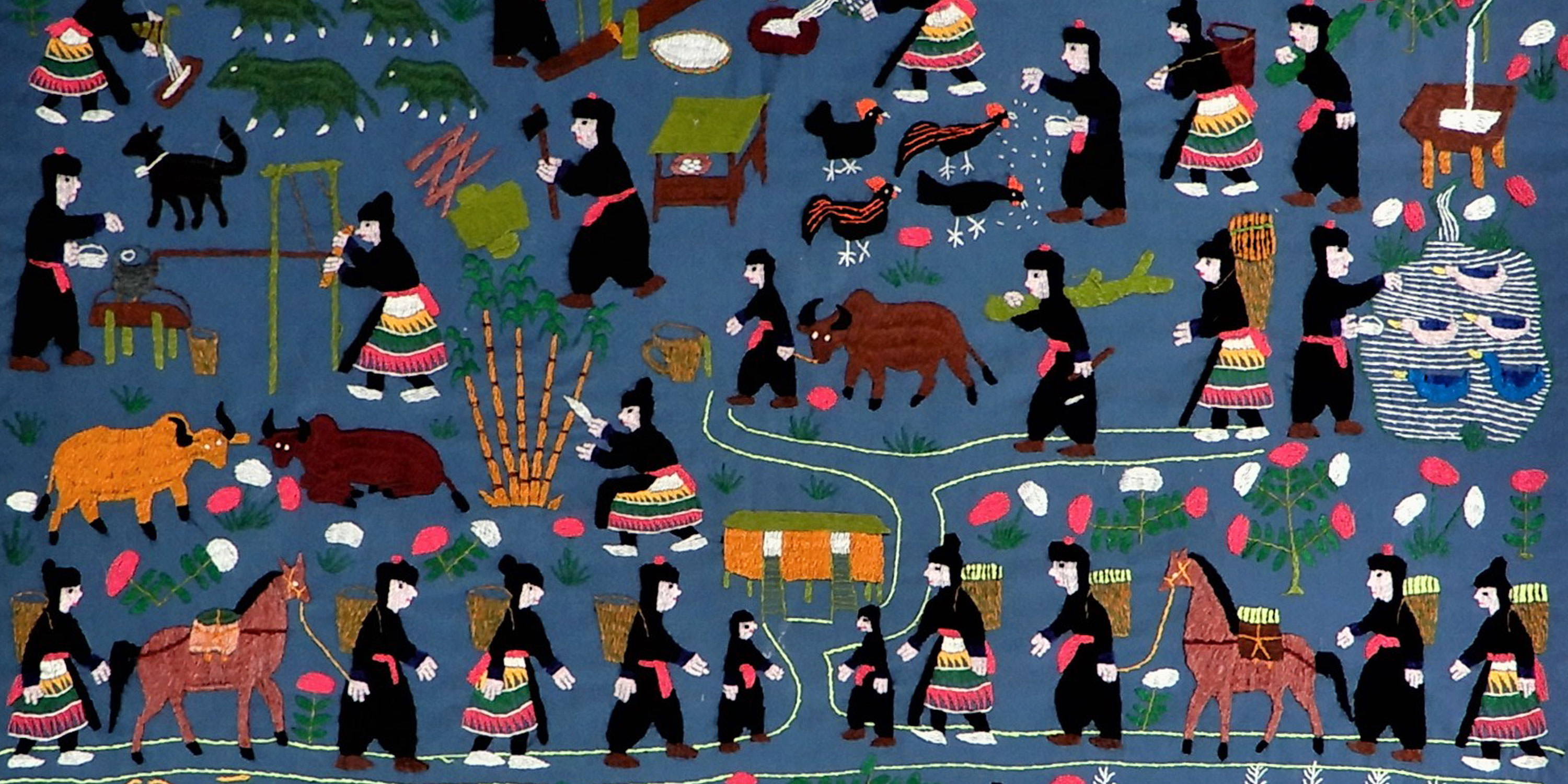 Detail image of embroidered Hmong story cloth