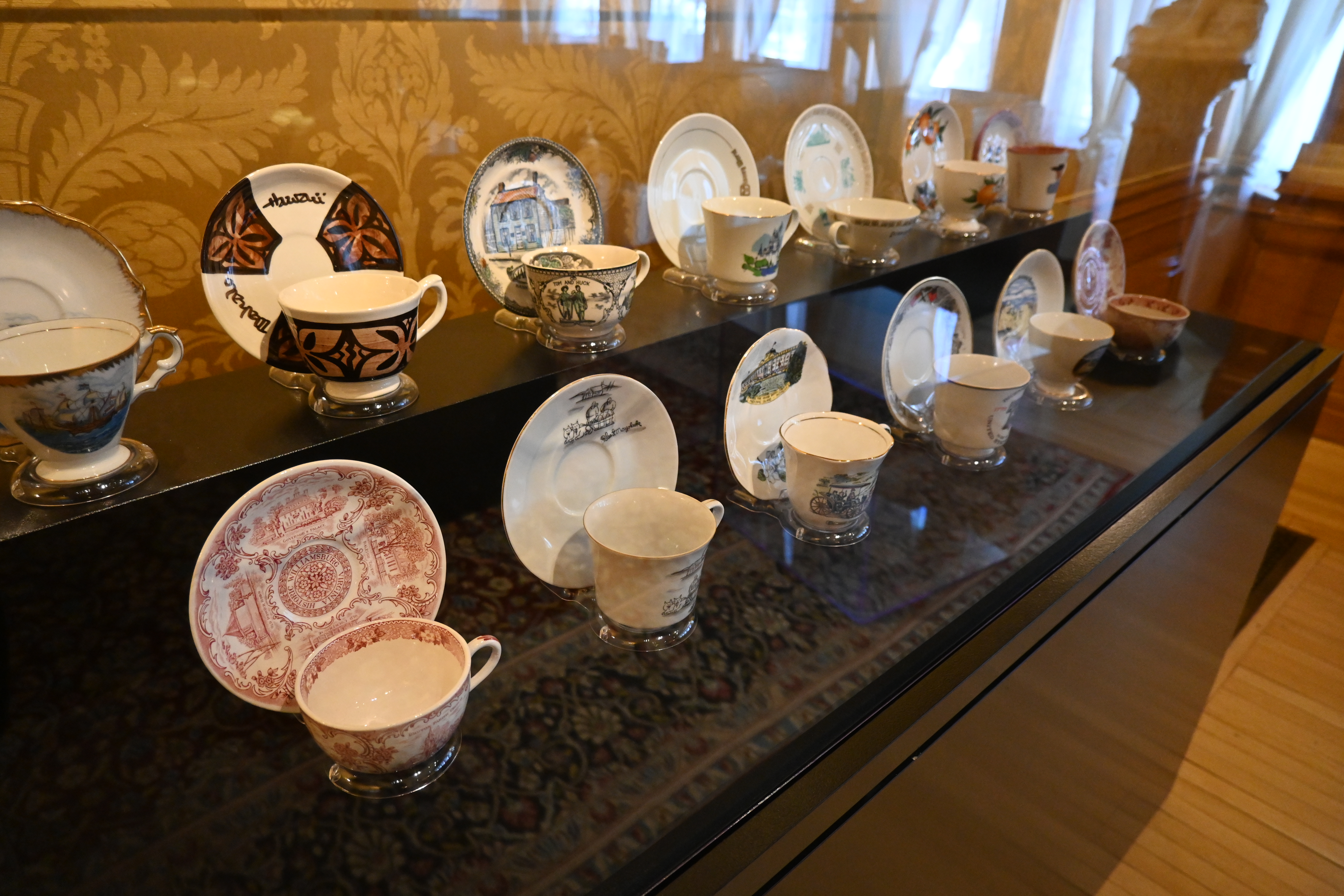 Souvenir teacups on display in the exhibition